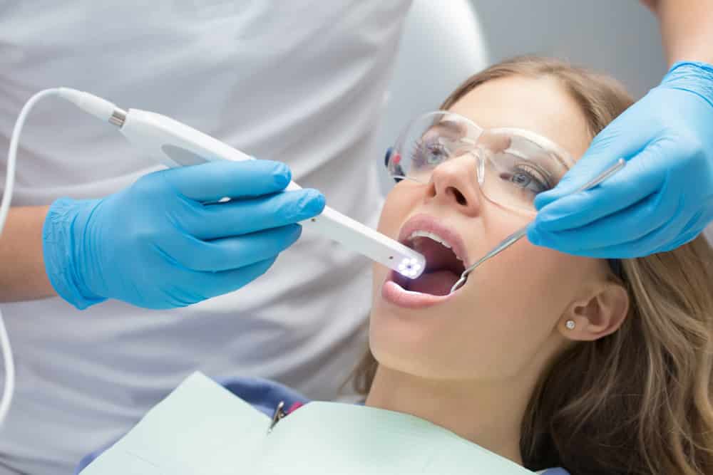Dentist Using Articulator — Dental in Lake Haven, NSW
