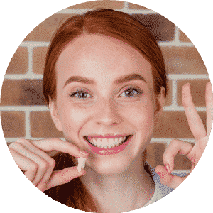 Girl Holding White Wisdom Tooth — Dental in Lake Heaven, NSW